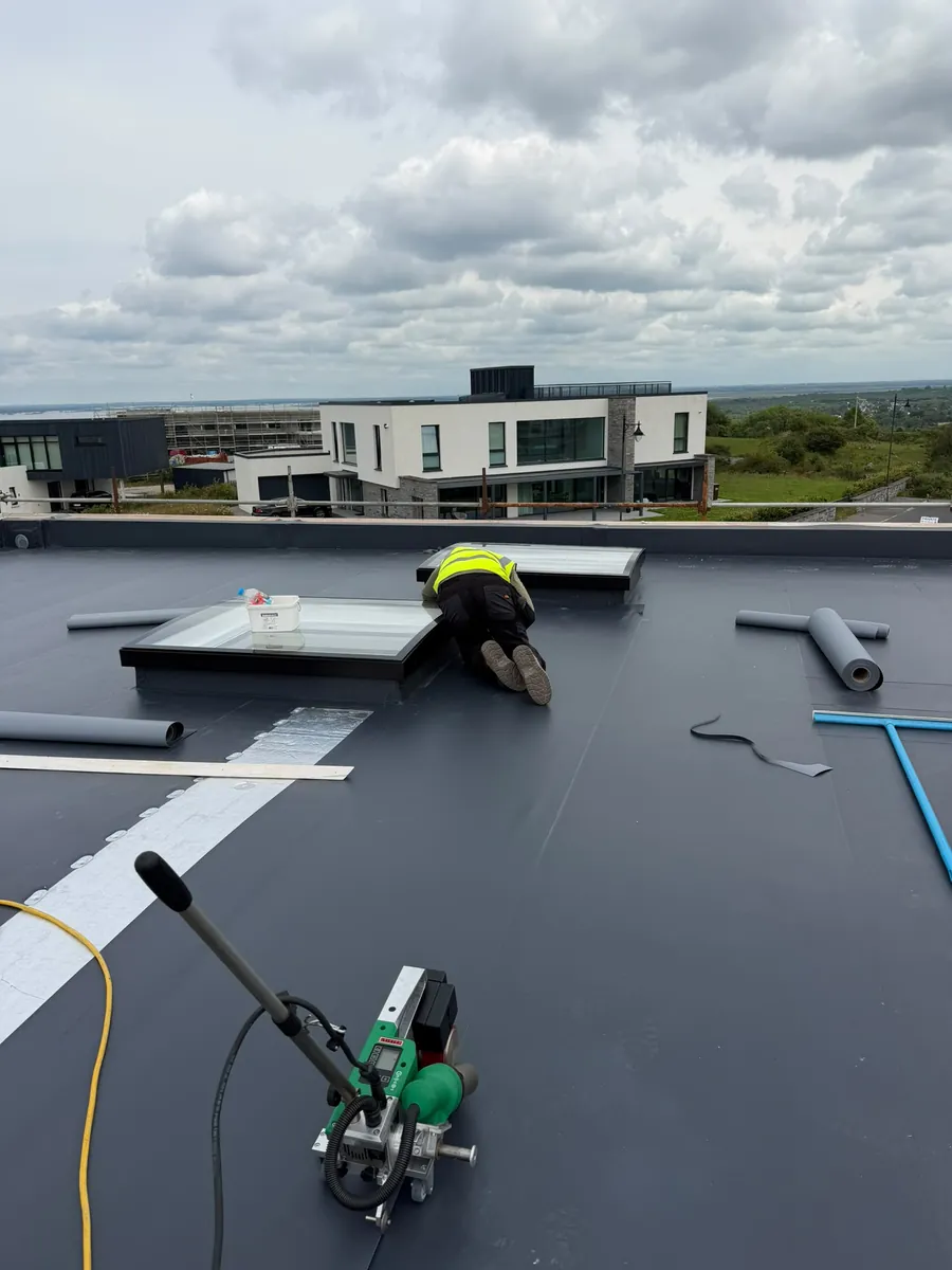 PVC membrane installation with a hot-air welding machine by Govin Roofing Systems