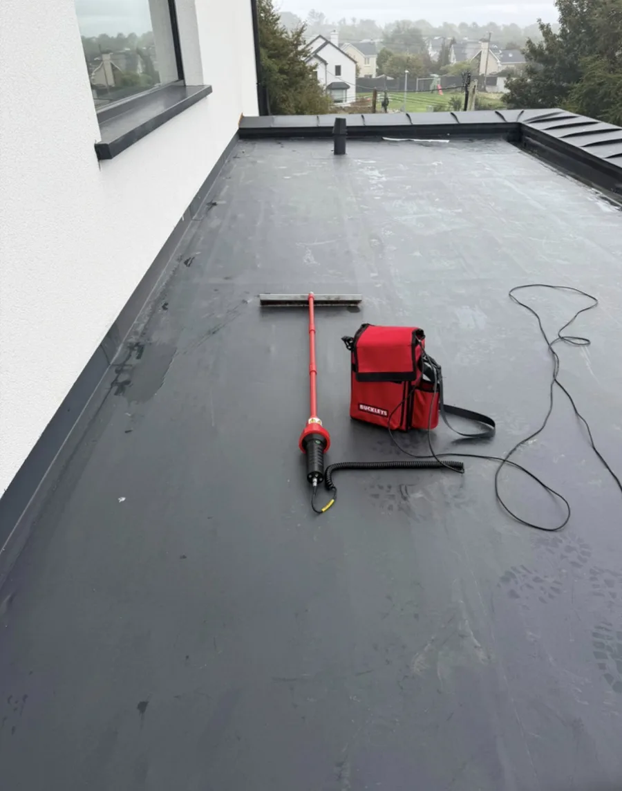 Electronic leak detection equipment set up on a flat roof by Govin Roofing Systems