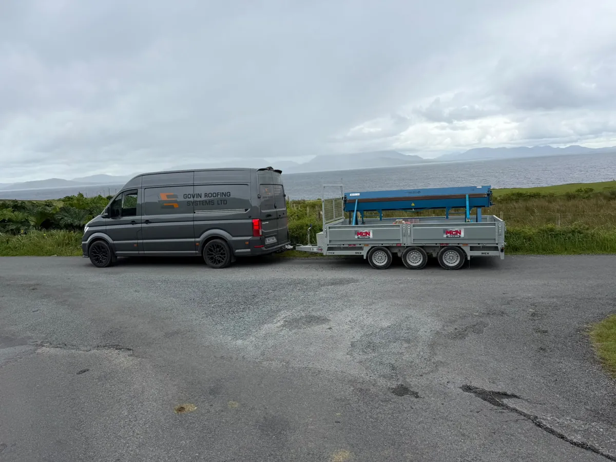Govin Roofing Systems van and trailer on site